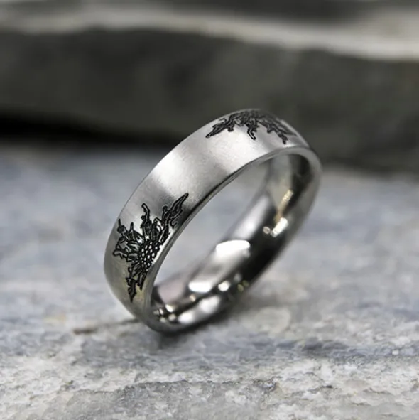 Anillo Titanio con 4 Eguzkilores Personalizable